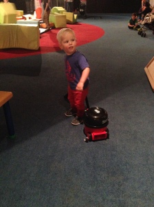 James with the toy Henry vacuum