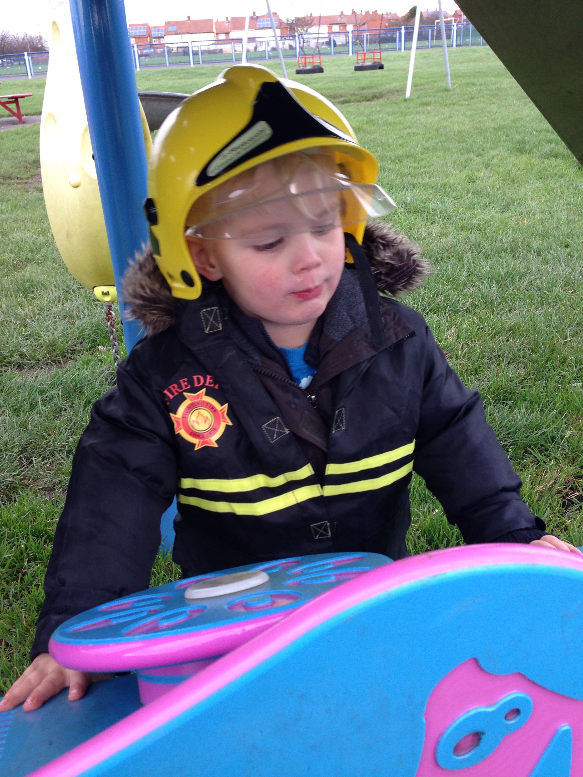 checking out his next mission as a fire fighter